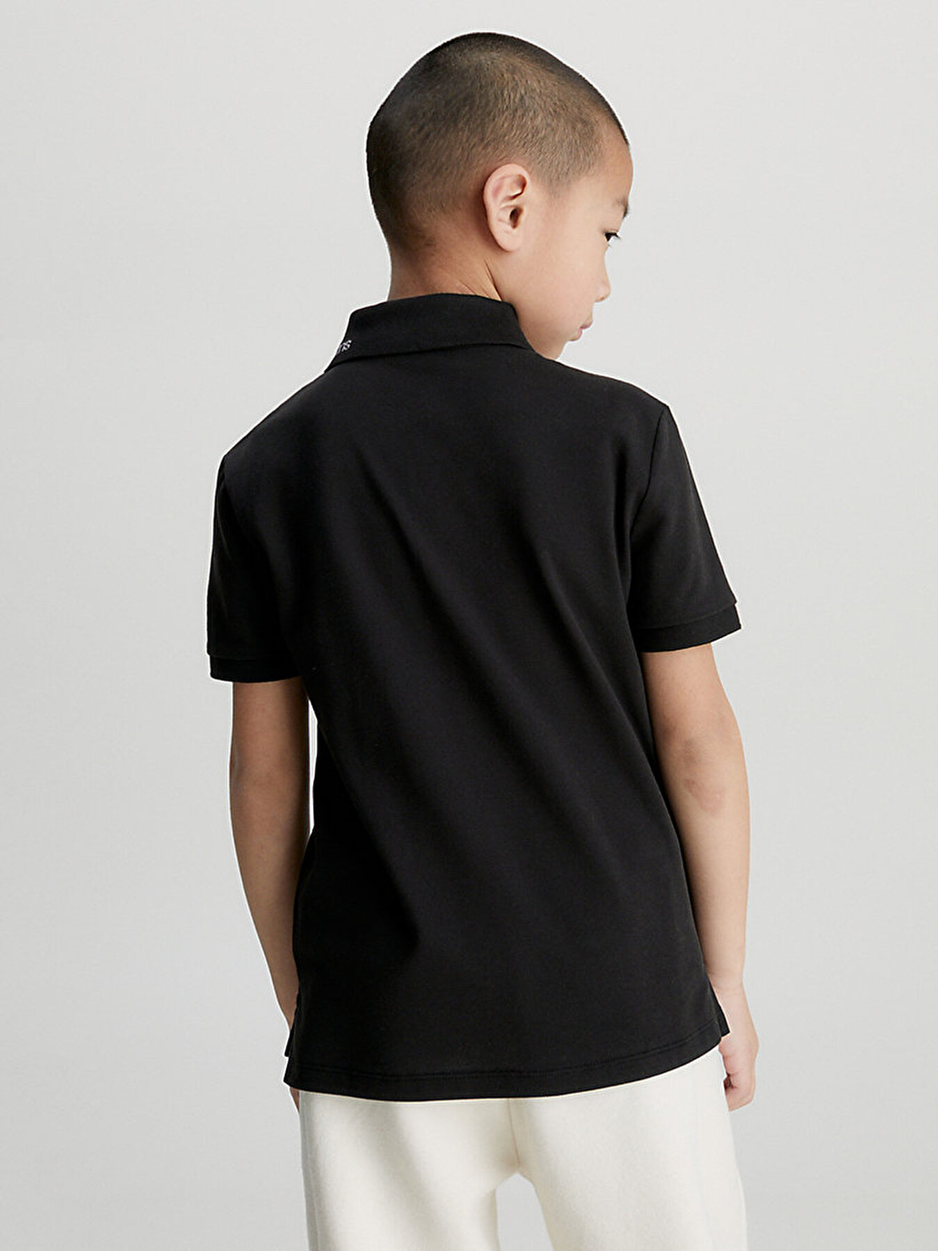 Calvin | Pique Erkek Klein Logo Polo T-Shirt Çocuk IB0IB01742BEH Siyah Intarsia