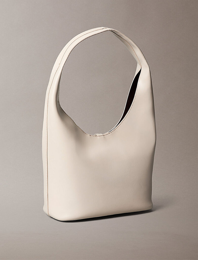 Calvin Klein Bej Renkli Kadın Stone Lock Slouchy Çapraz Çanta